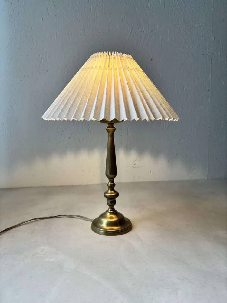 Brass table lamp with pleated shade, 1960s vintage design.