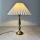 Brass table lamp with pleated shade, 1960s vintage design.