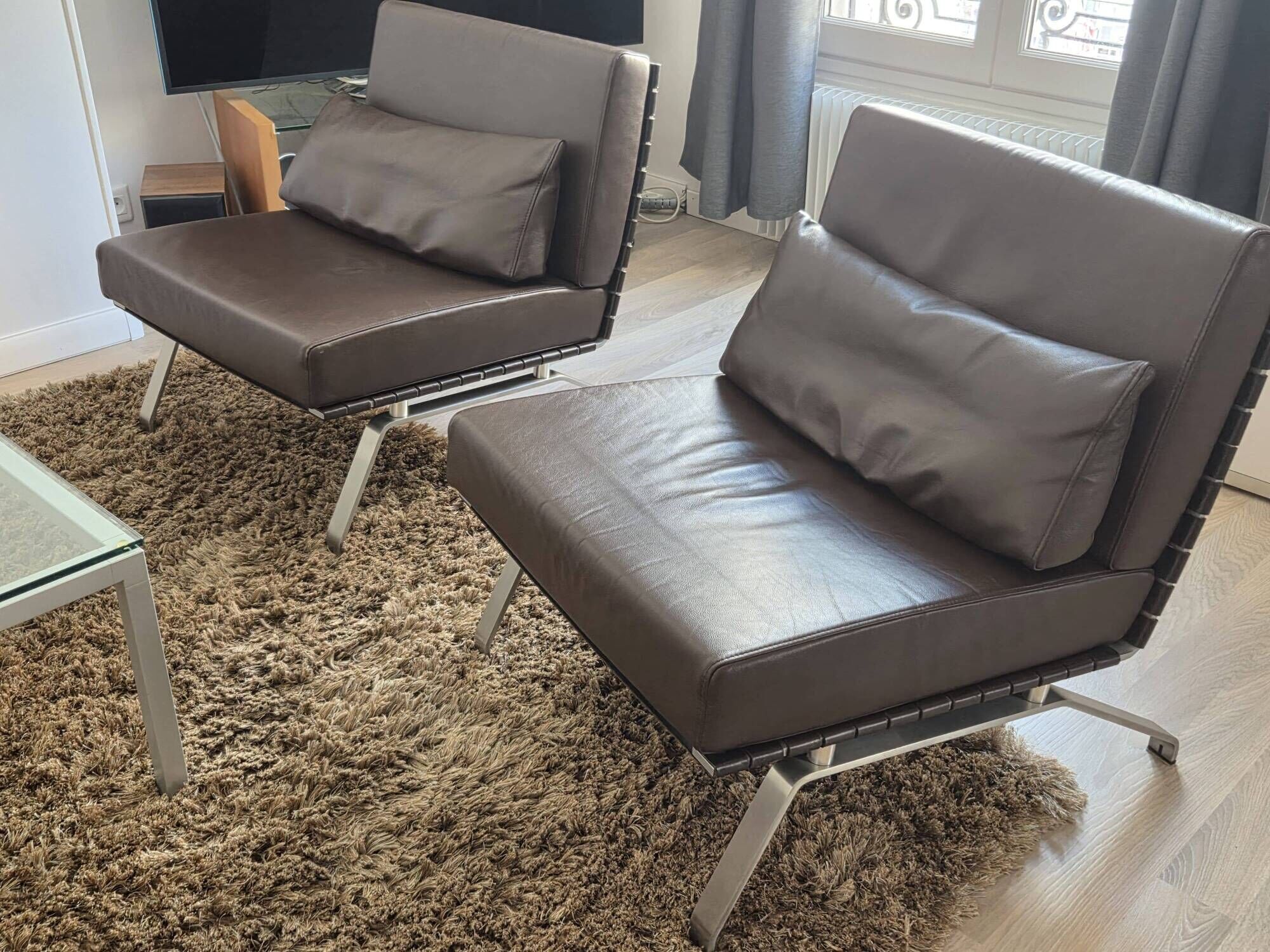 2 ligne roset flexus armchairs – full-grain leather
