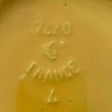 Old yellow porcelain pitcher stamped Saint Clément