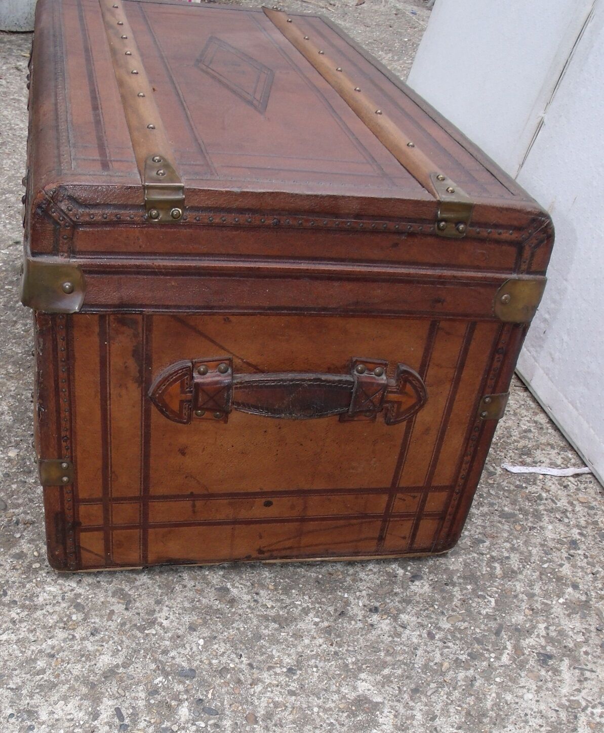 Old wooden trunk covered leather travel chest