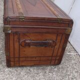 Old wooden trunk covered leather travel chest