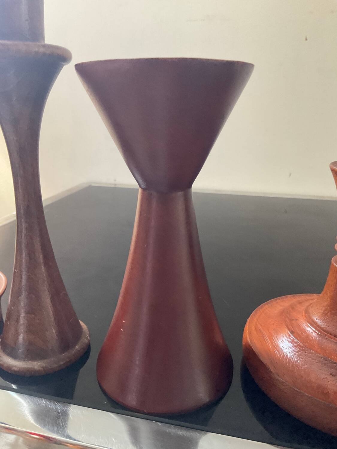 Set of 4 Scandinavian teak candlesticks