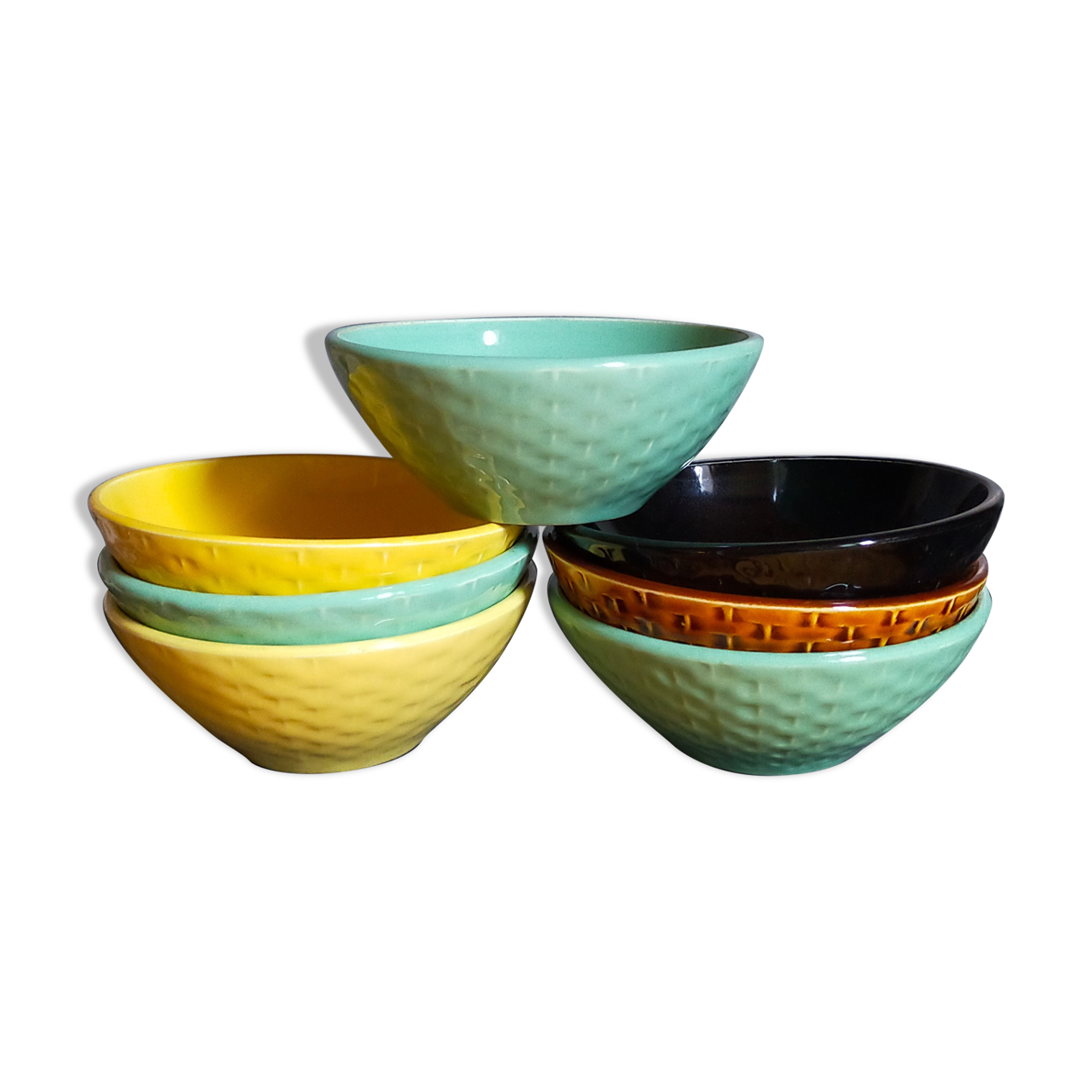 Seven vintage slip ceramic bowls