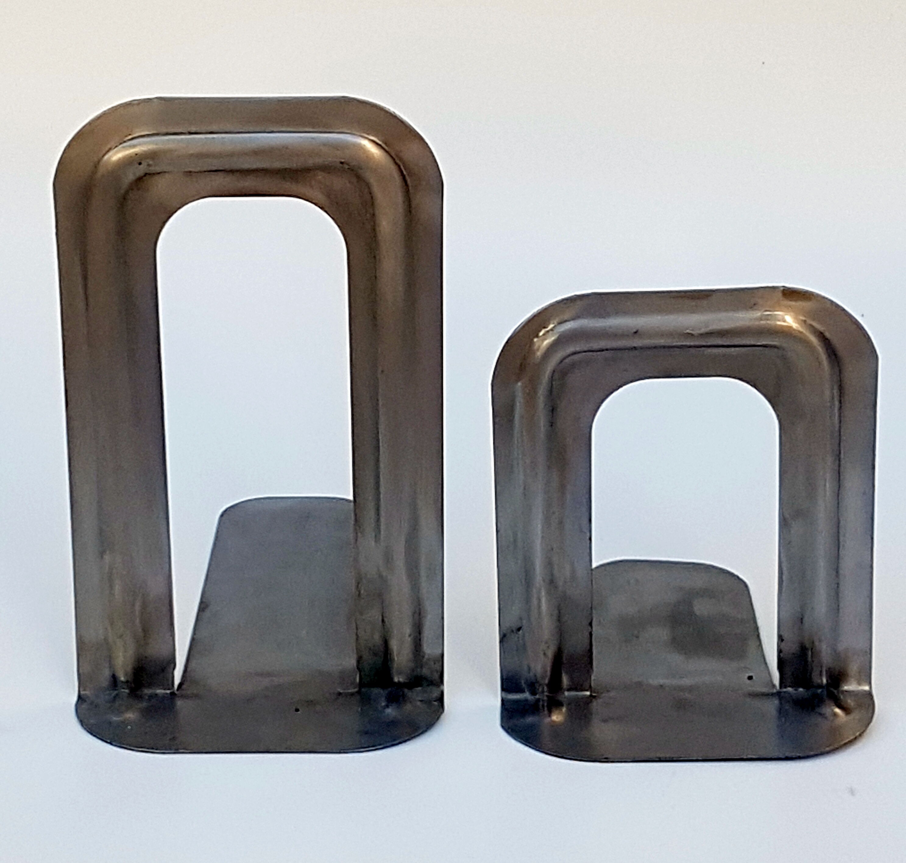 Metal book clamsended by Bernard-Albin Gras for Gras Ravel