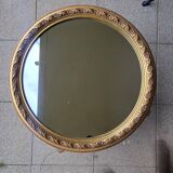 Large round mirror in Spanish gilded carved wood