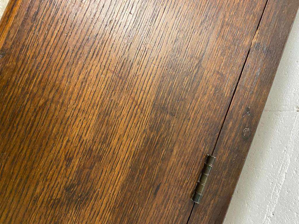 Antique wooden bench with pinned construction