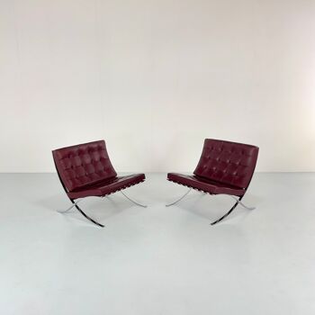 Pair of "Barcelona" armchairs by Ludwig Mies van der Rohe for Knoll.