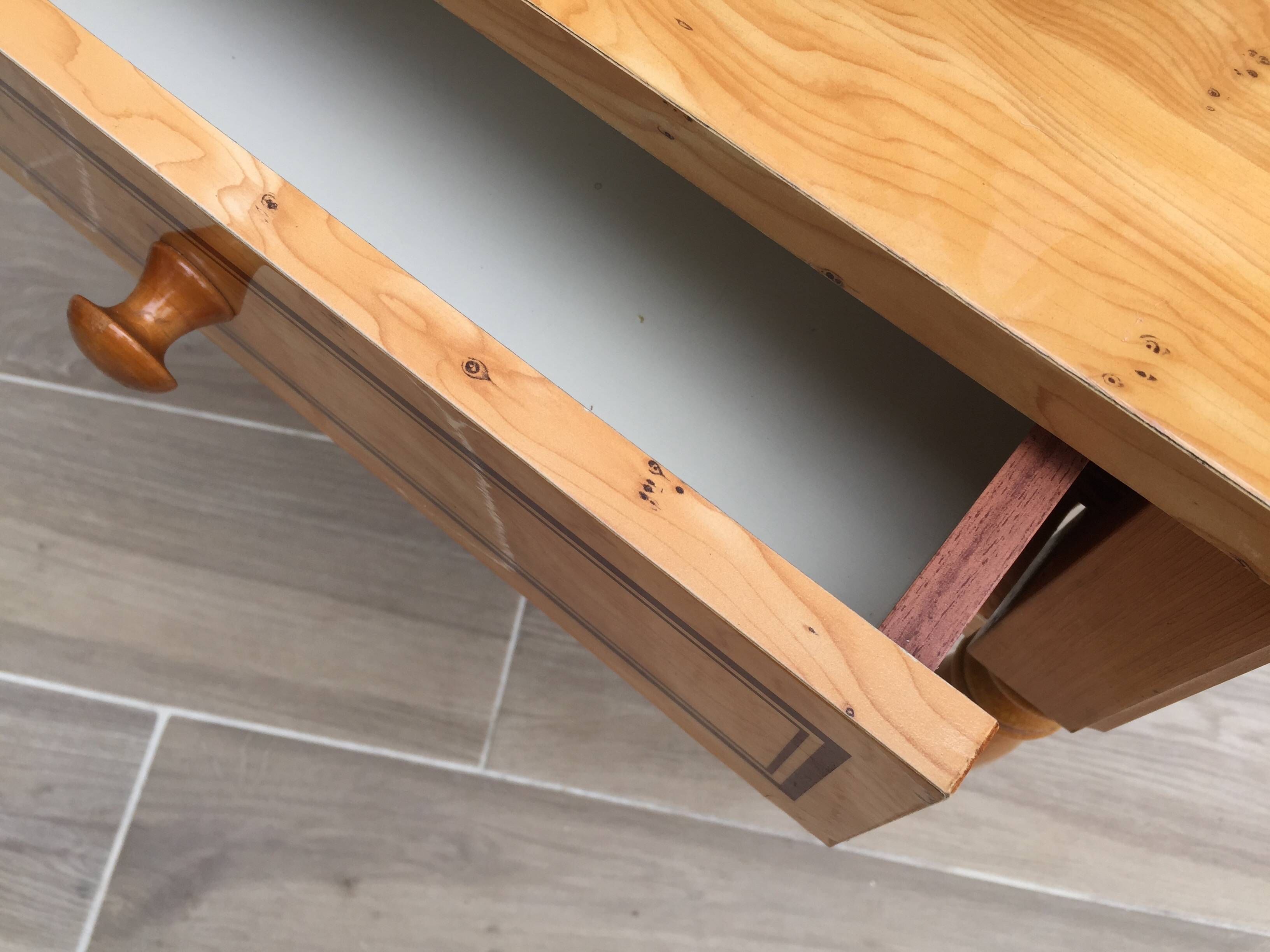Formica and vintage wood bedside table