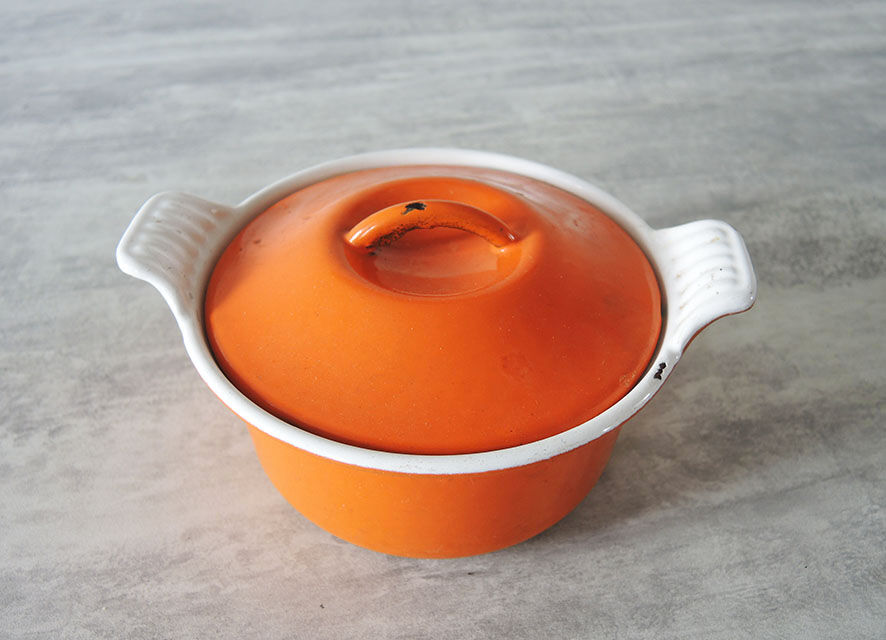 Old cast iron pot enamelled orange Le Creuset