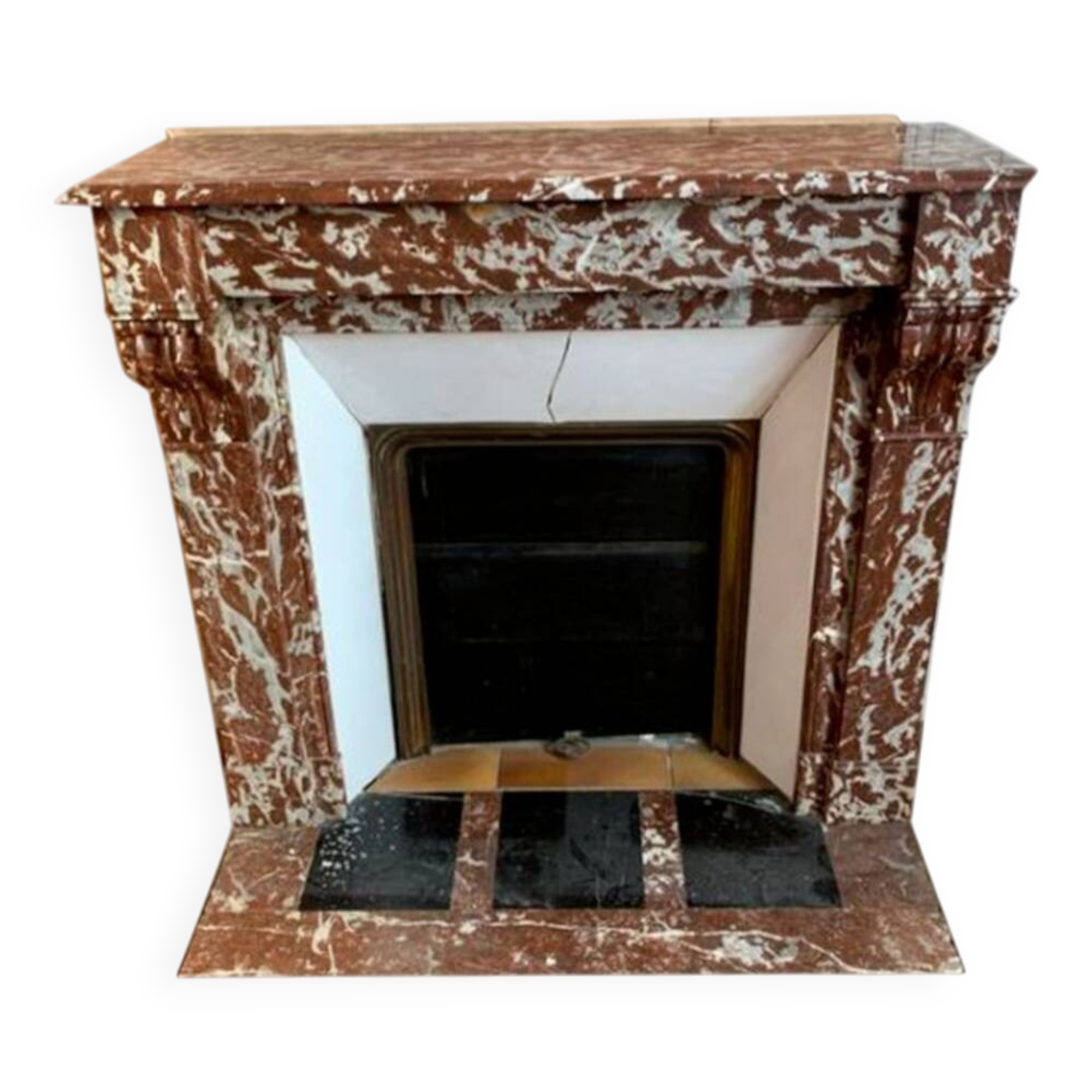 Red marble fireplace with modillion