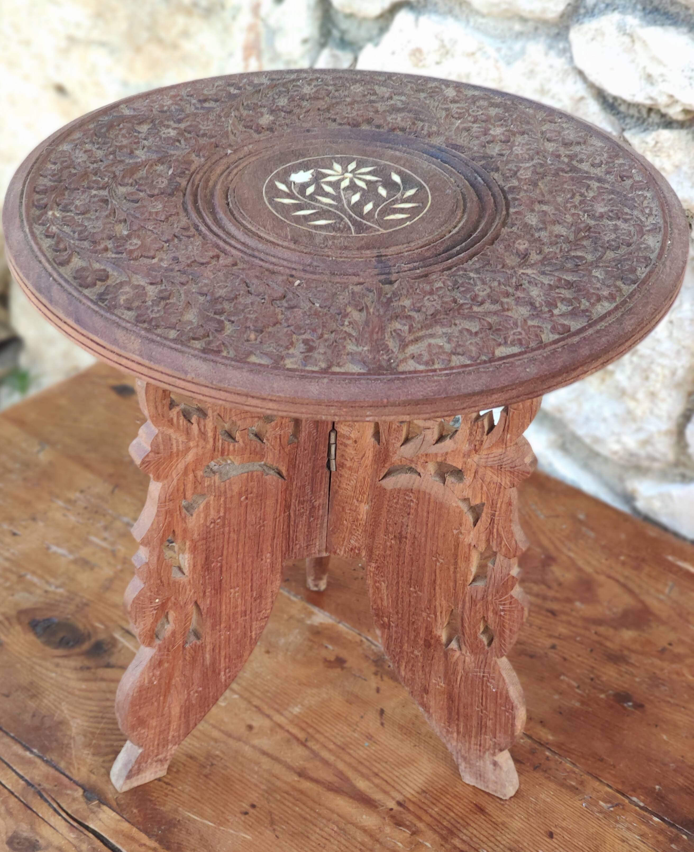 Old small carved wooden table