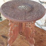 Old small carved wooden table