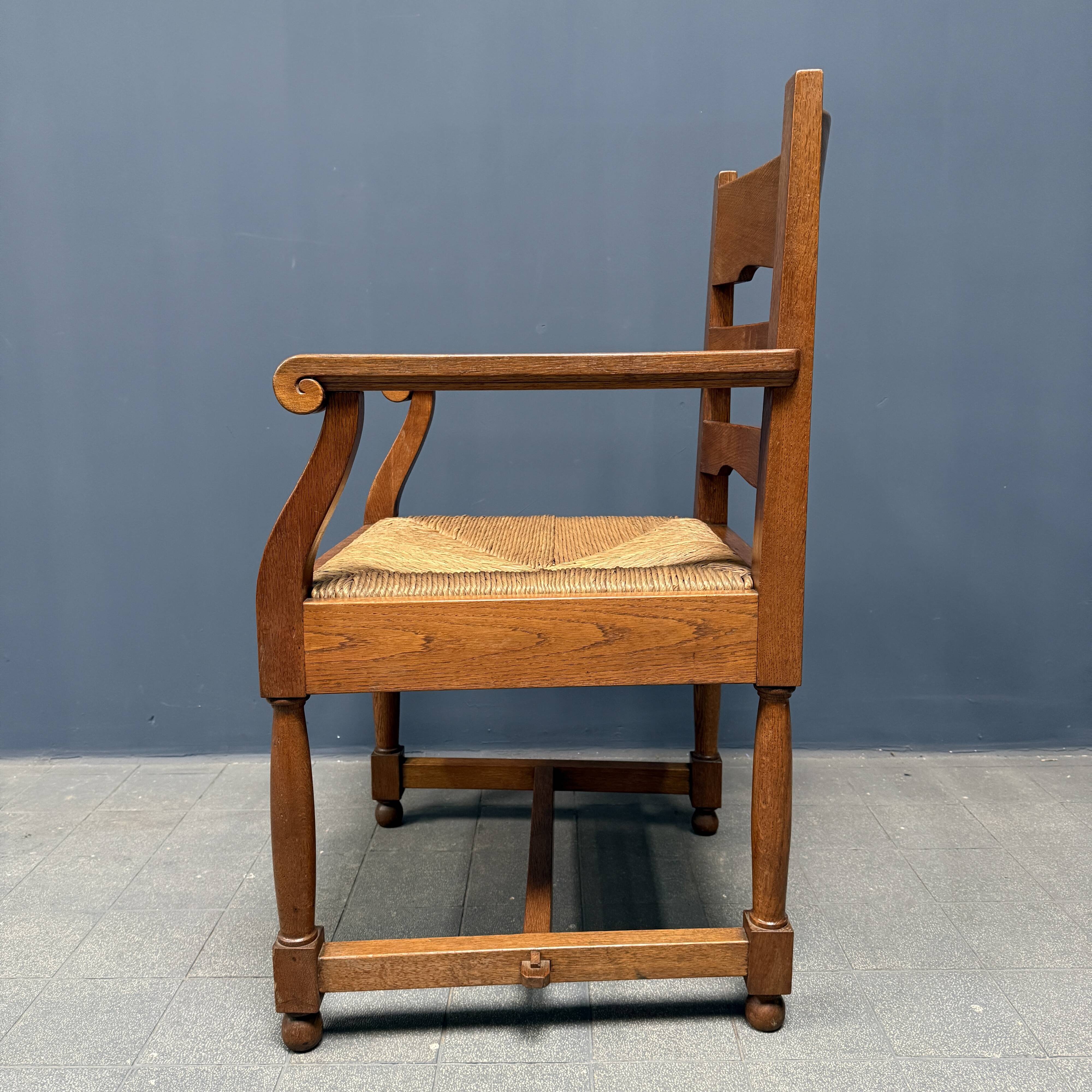 Set of two Dutch oak armchairs with rush seats