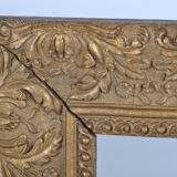 Old wooden frame, gilded stucco
