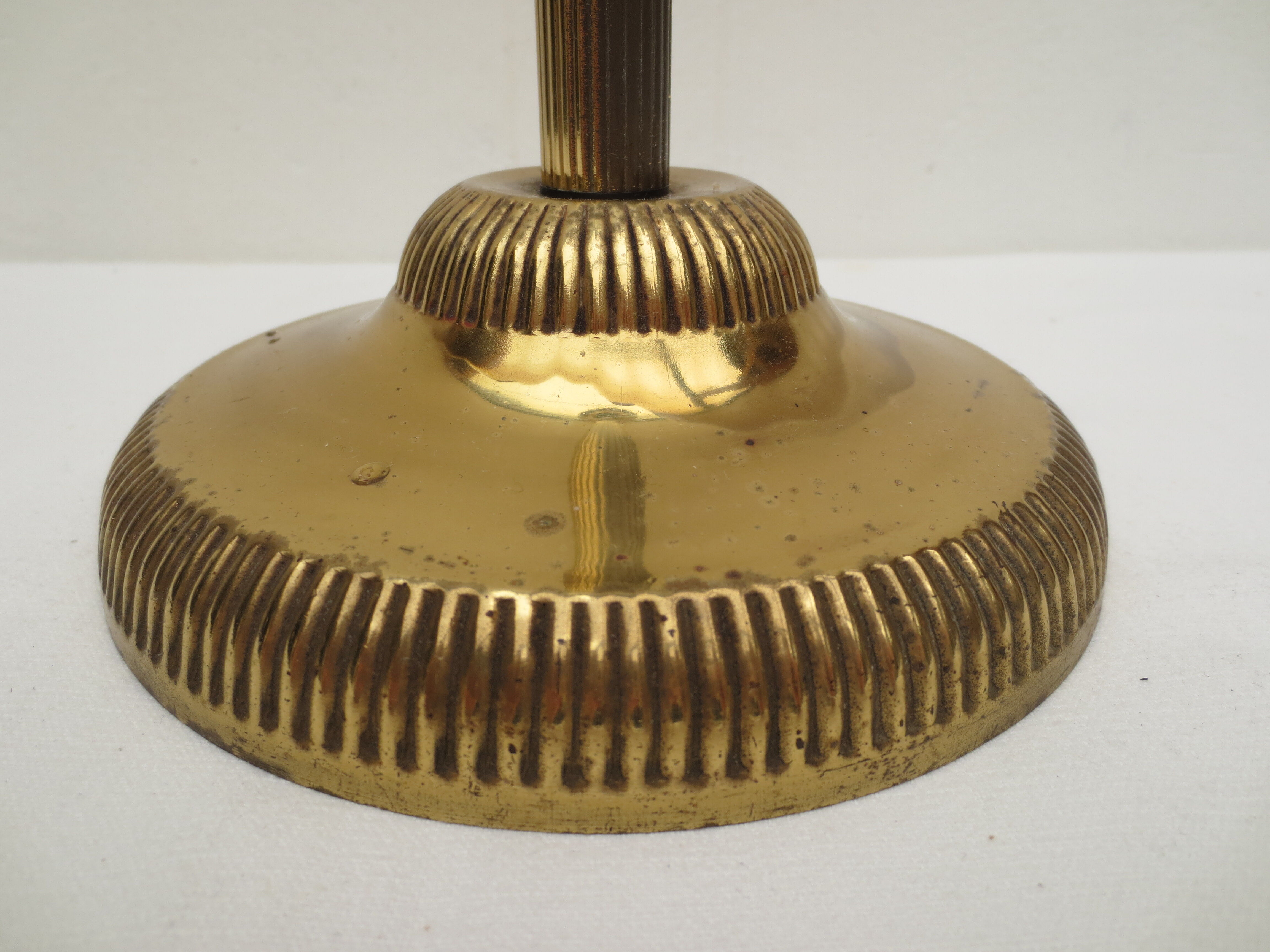 Old ashtray on foot year 50 in gilded brass
