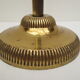 Old ashtray on foot year 50 in gilded brass