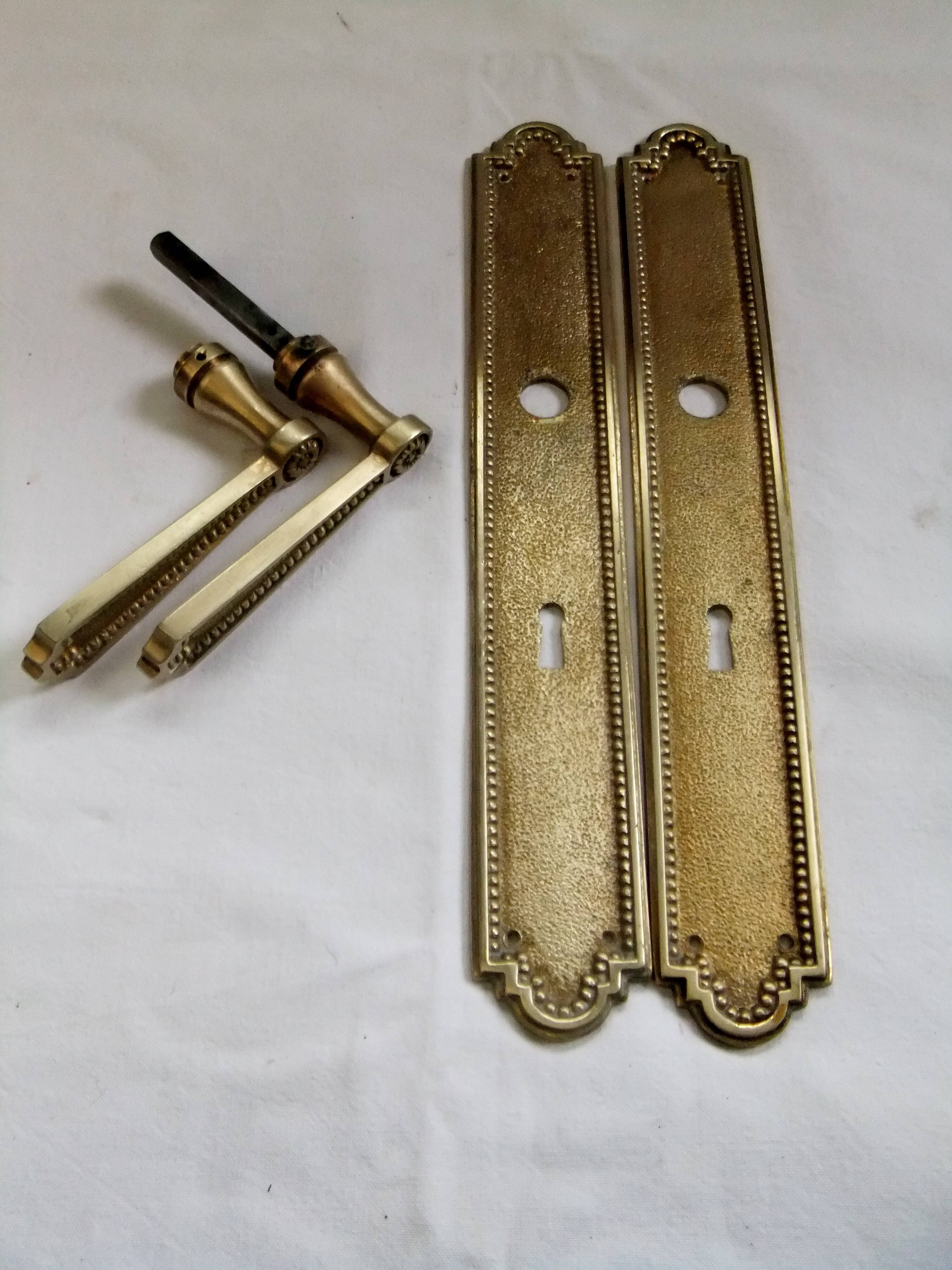 Pair of Louis XVI style beaded bronze door handles