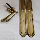 Pair of Louis XVI style beaded bronze door handles