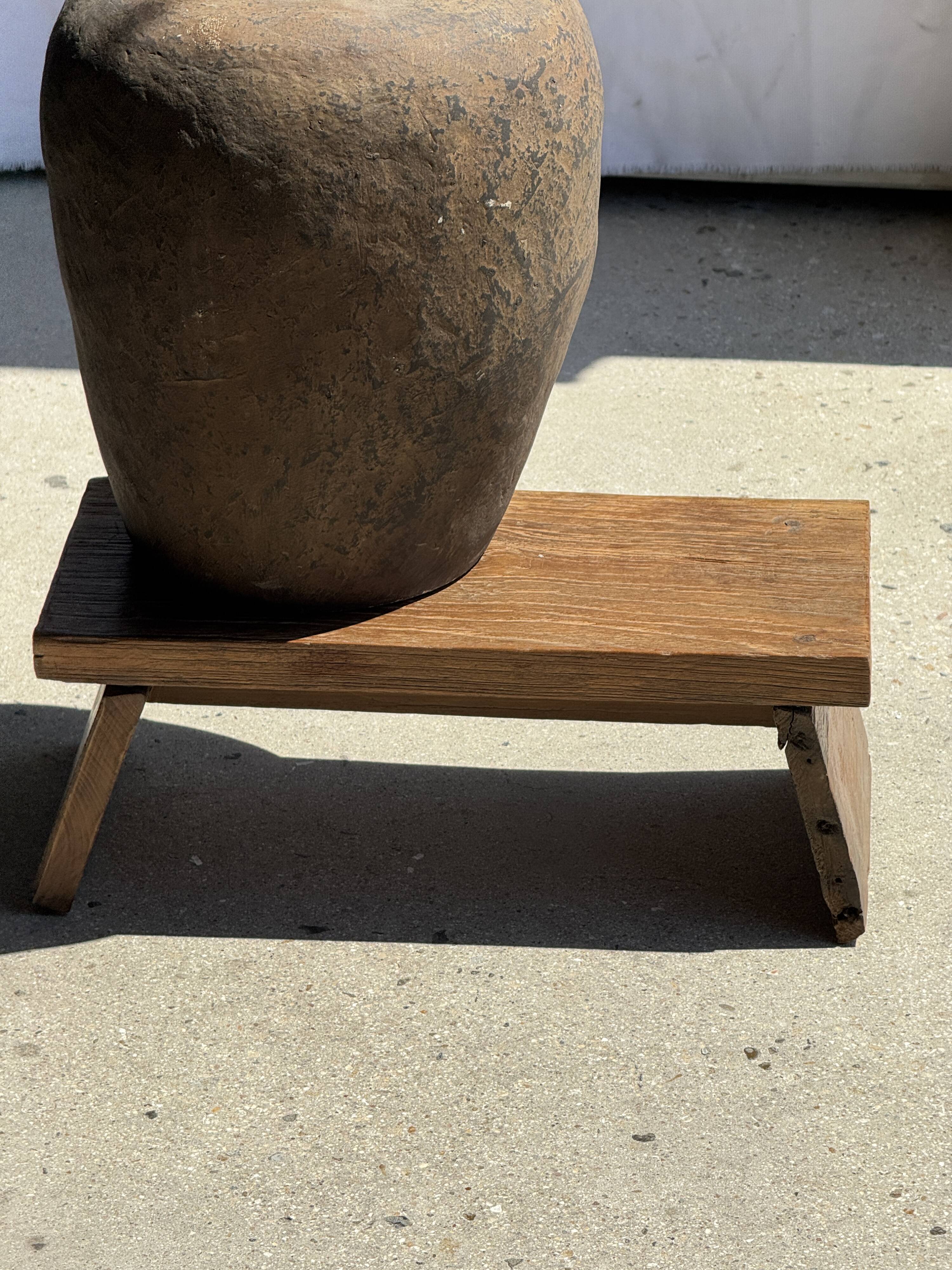 Small low bench in old teak from Indonesia H16 L39