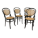Set of 4 bentwood bistro chairs in black with caning.