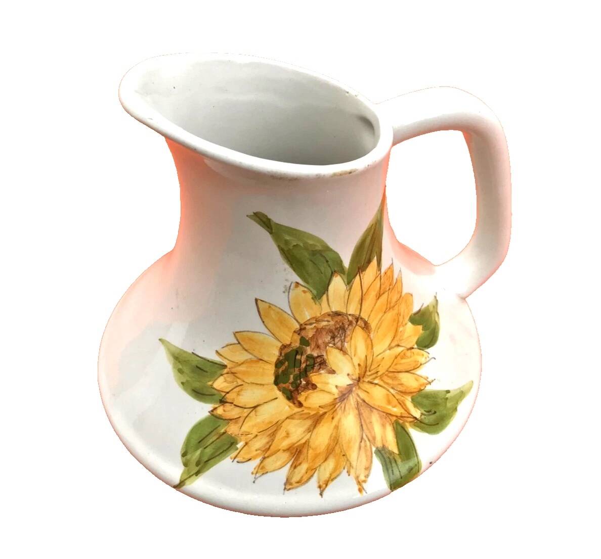 Antique glazed ceramic pitcher with sunflower decoration