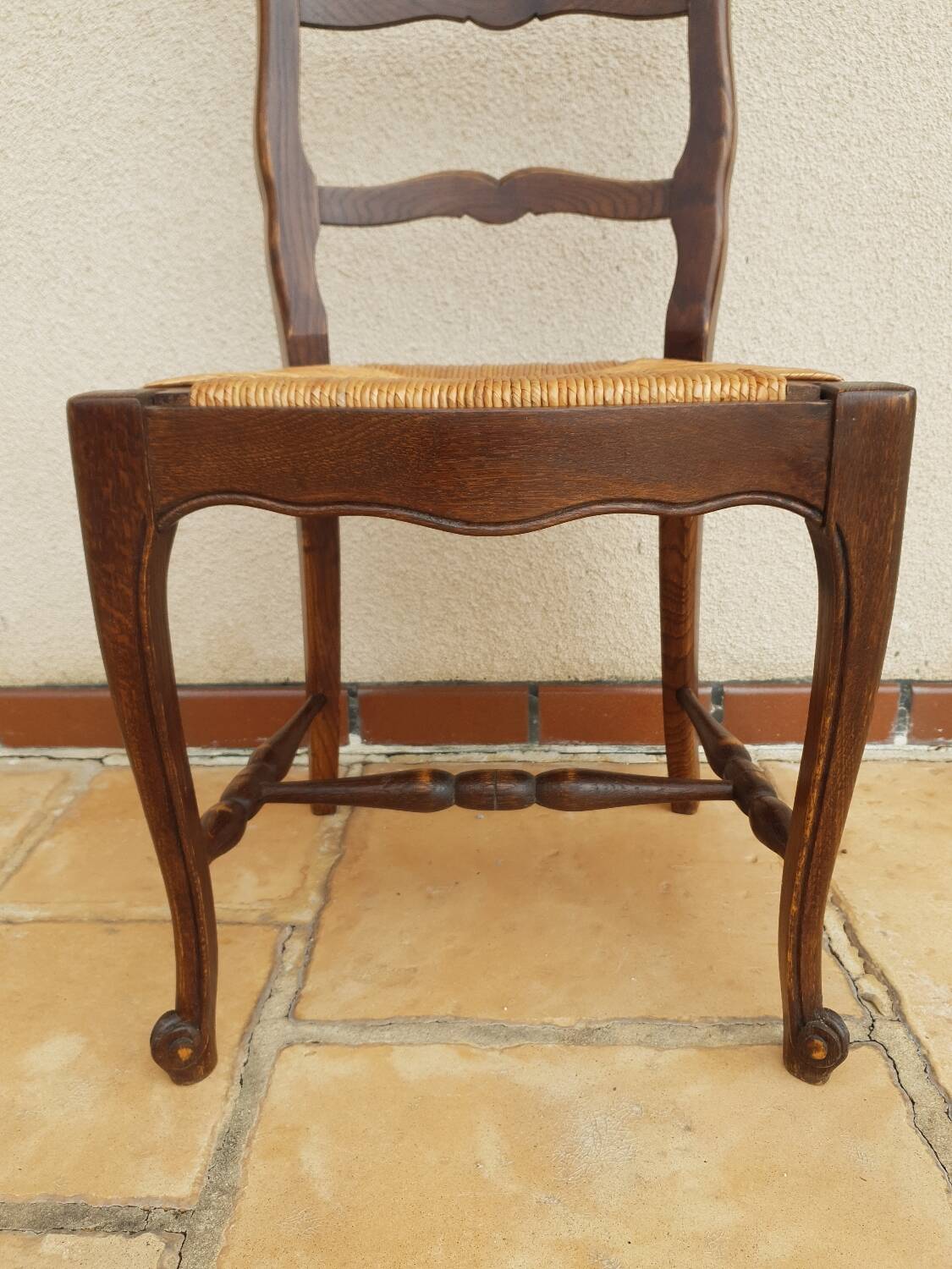 Regency chairs in straw-studded oak