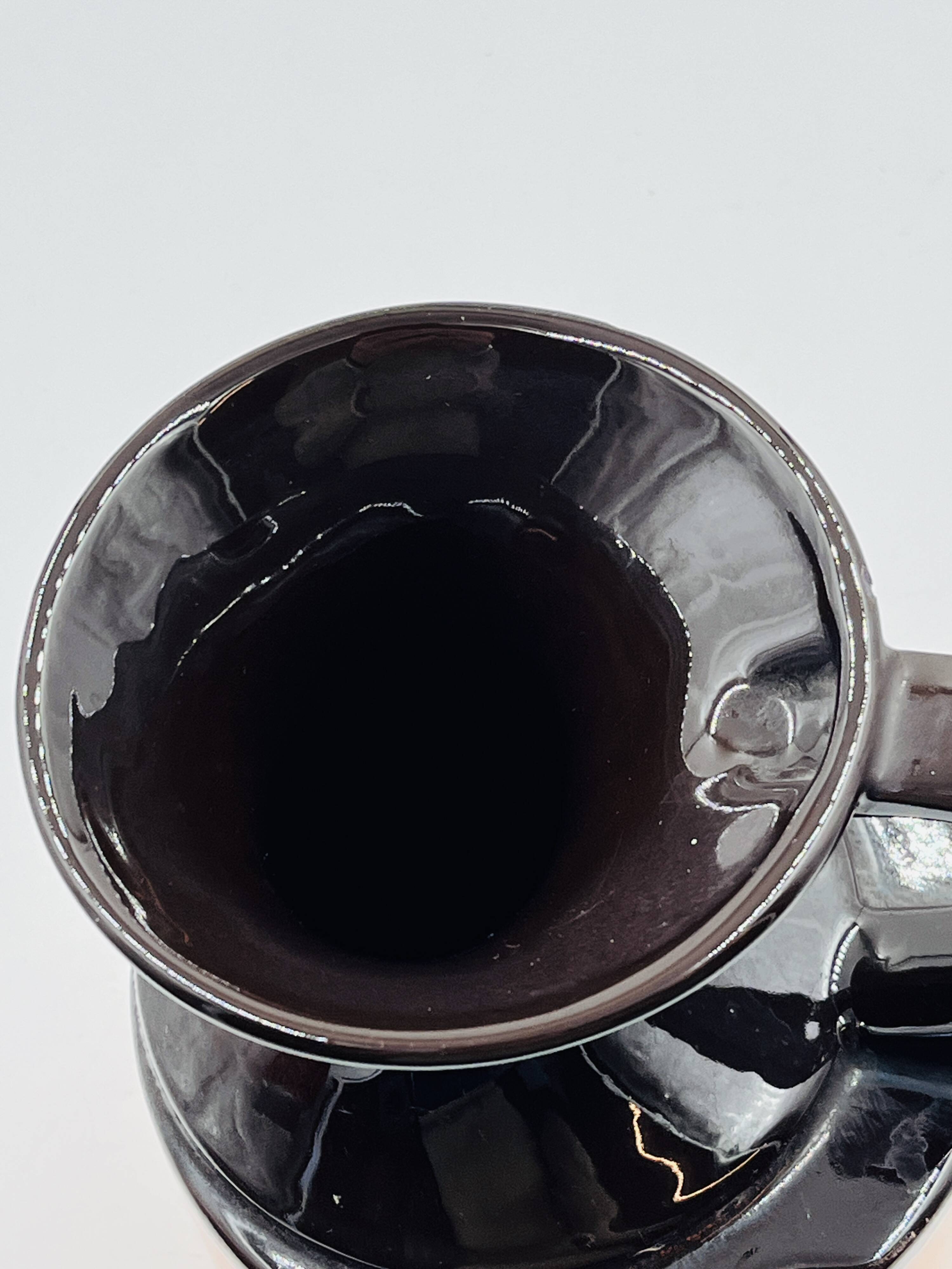 Modernist vase design, orange ceramic with relief cabochons from the 1970s.