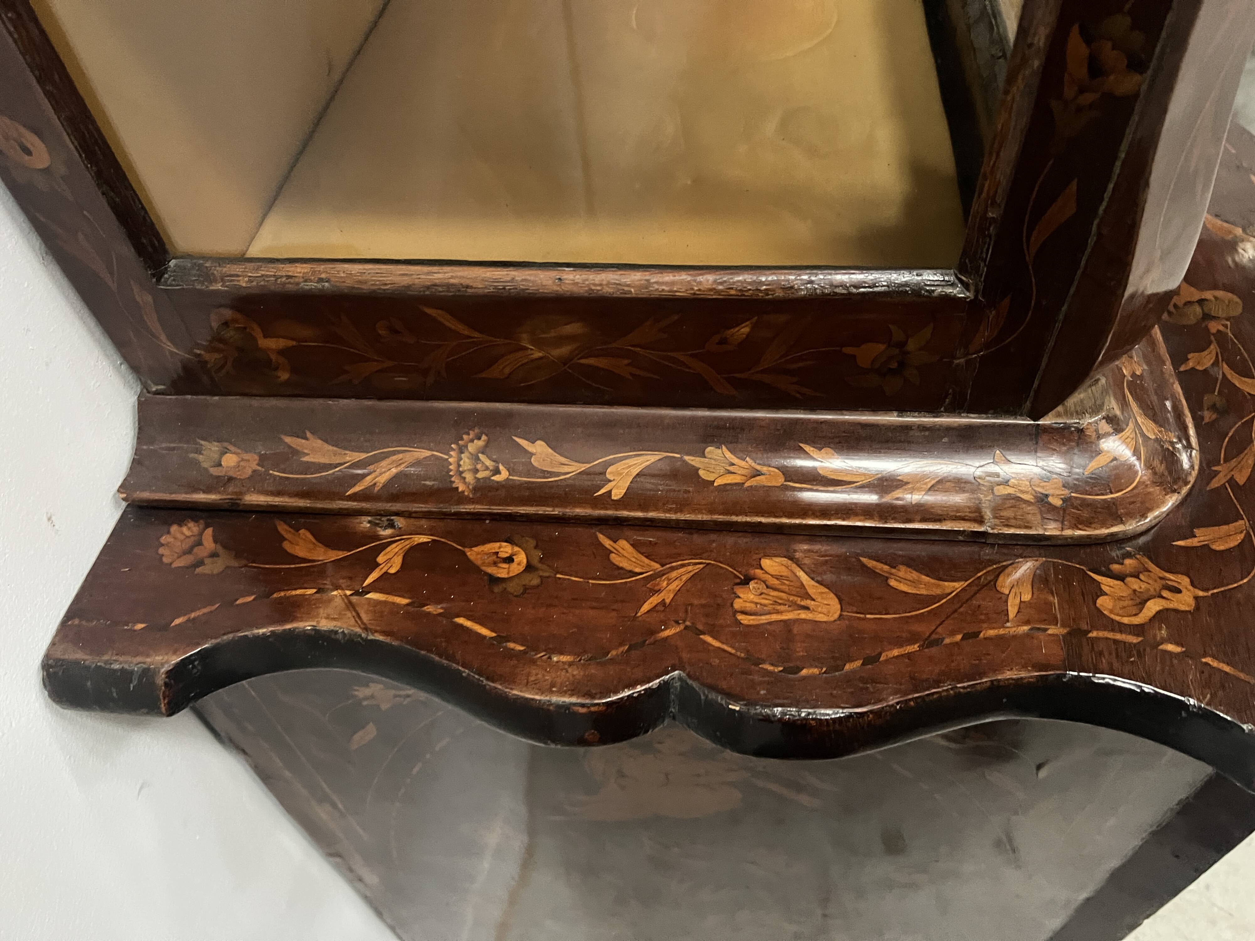 Dutch display cabinet in two parts made of marquetry wood.