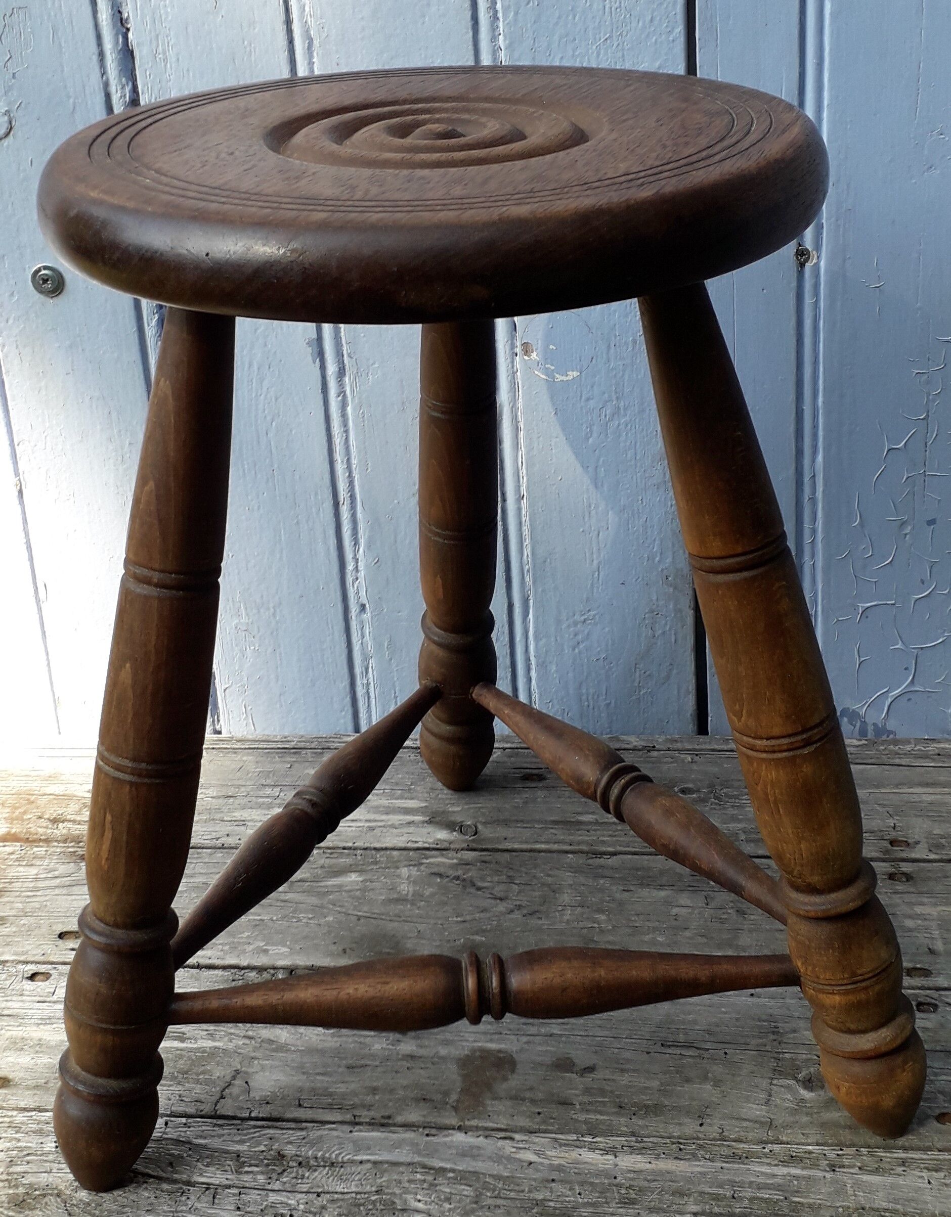 Wooden tripod stool