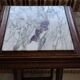 Solid wood side table with marble top