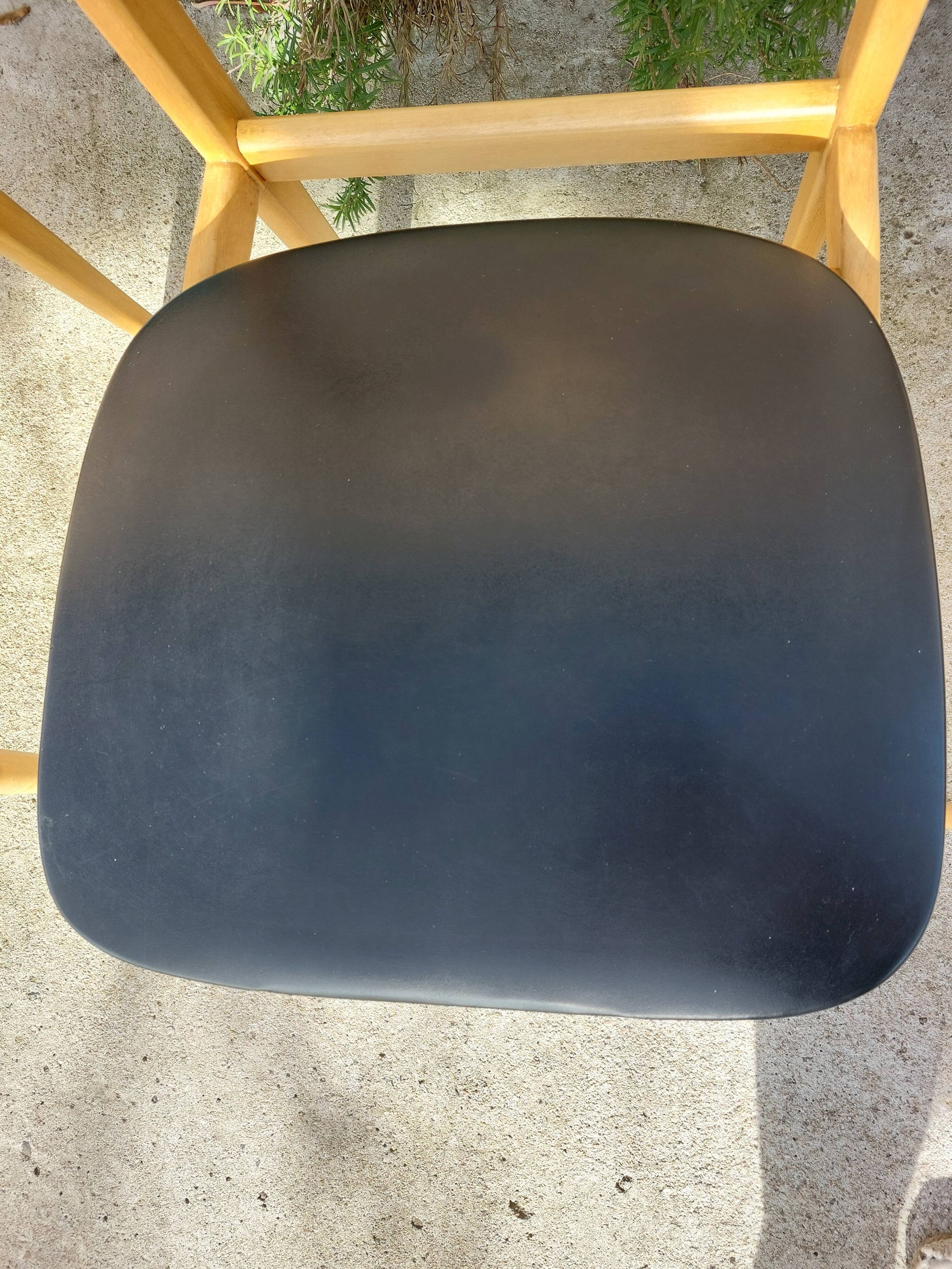 5 Scandinavian style chairs, wood and black faux leather.