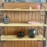 Pretty String shelf in very good condition.