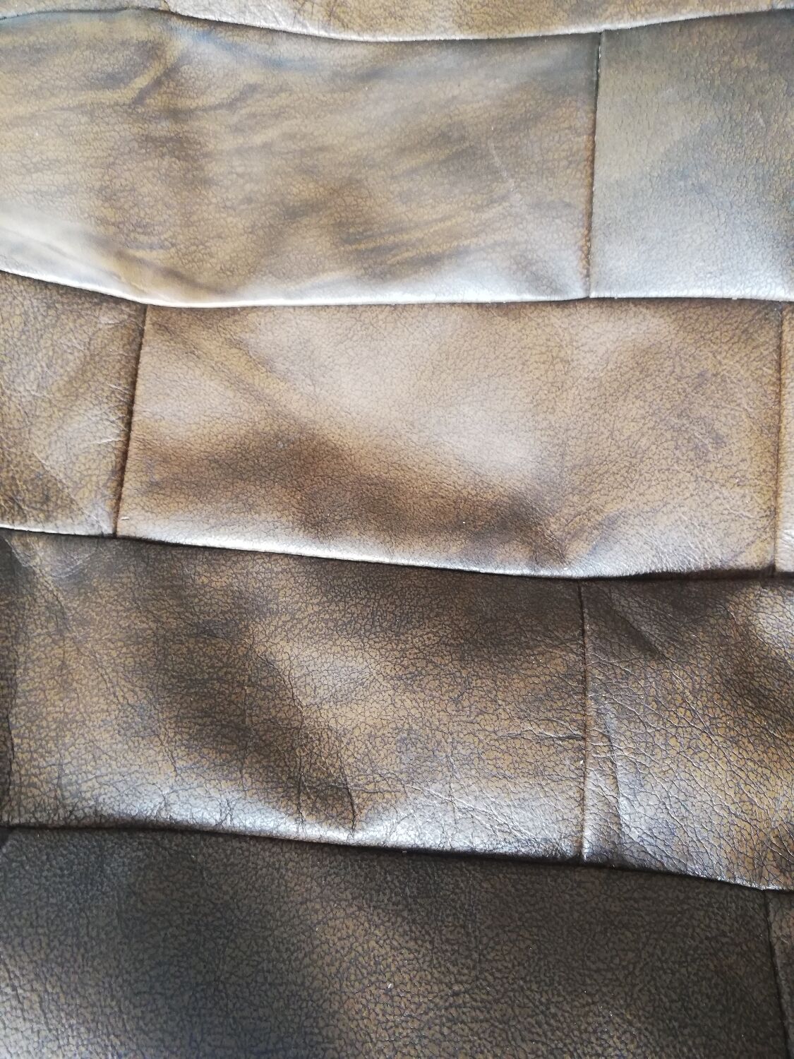 Brown round pouf imitation leather