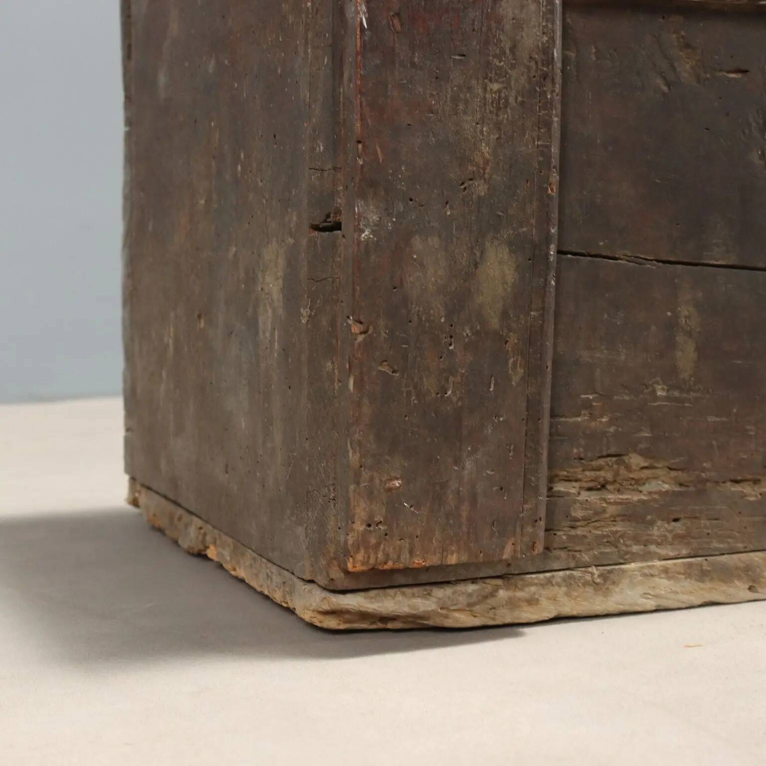Antique walnut chest with a hinged lid, Italy, 17th century.