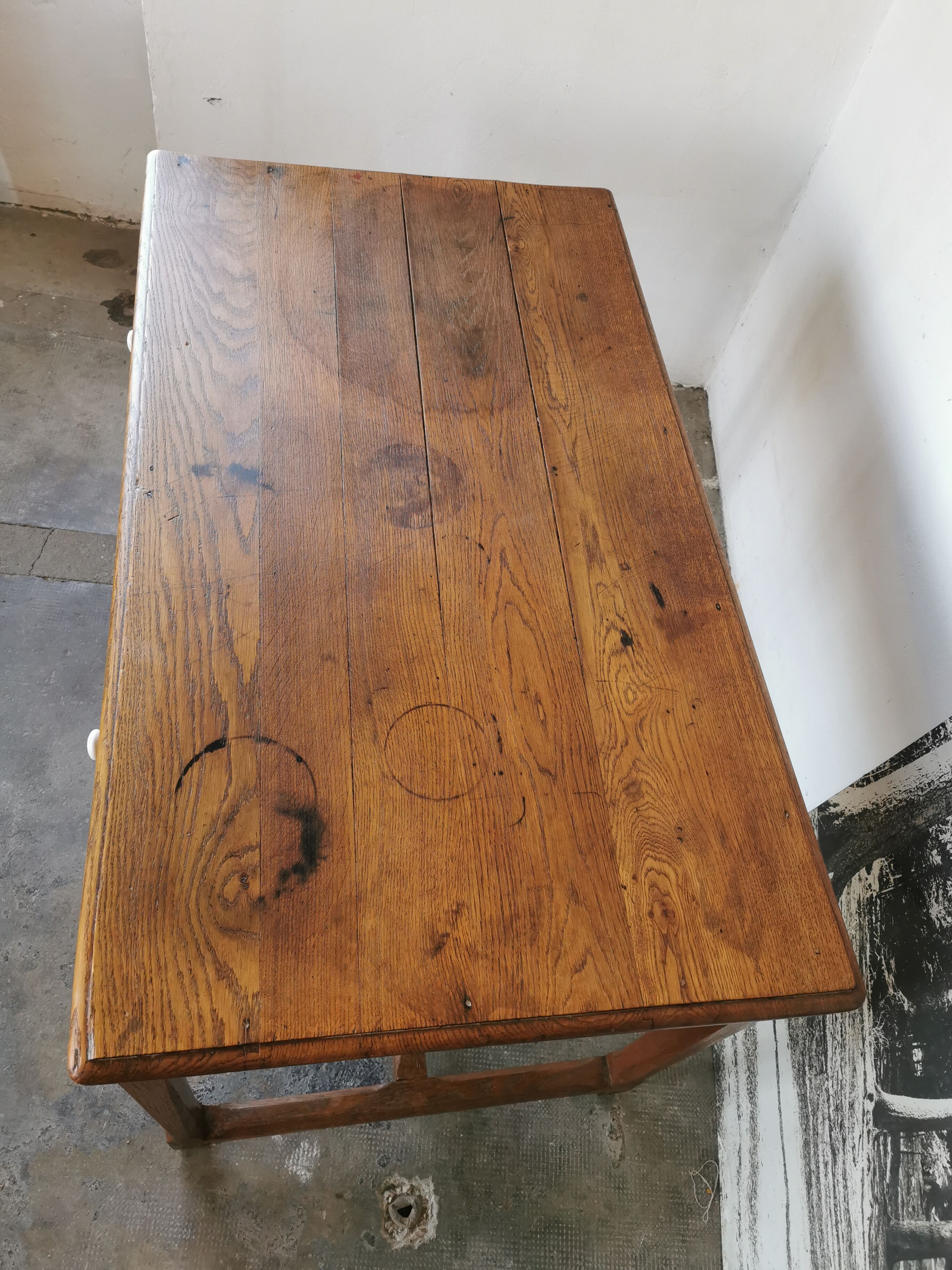 Table in raw oak, countryside.