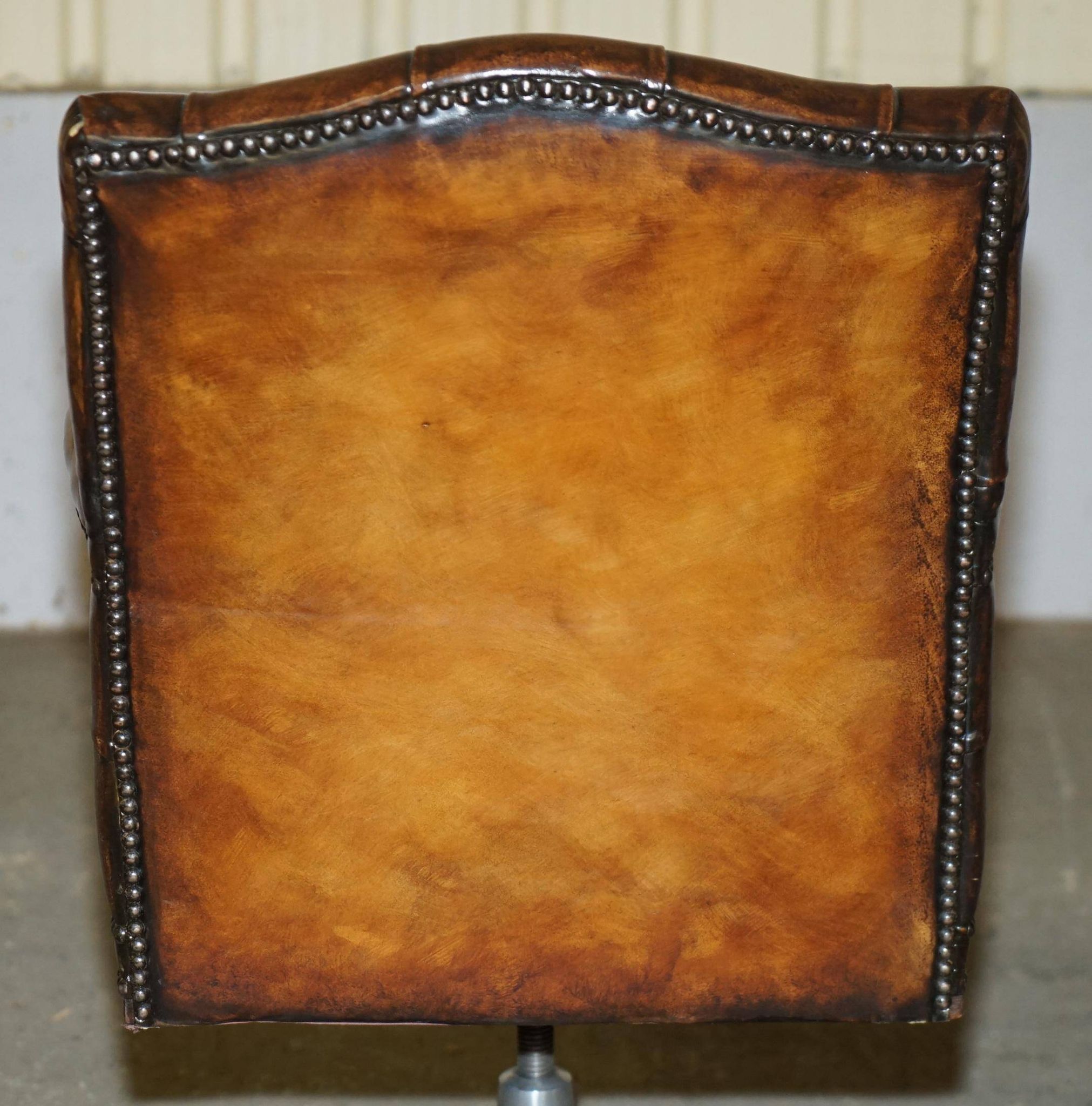 Restored leather captain's Chesterfield chair