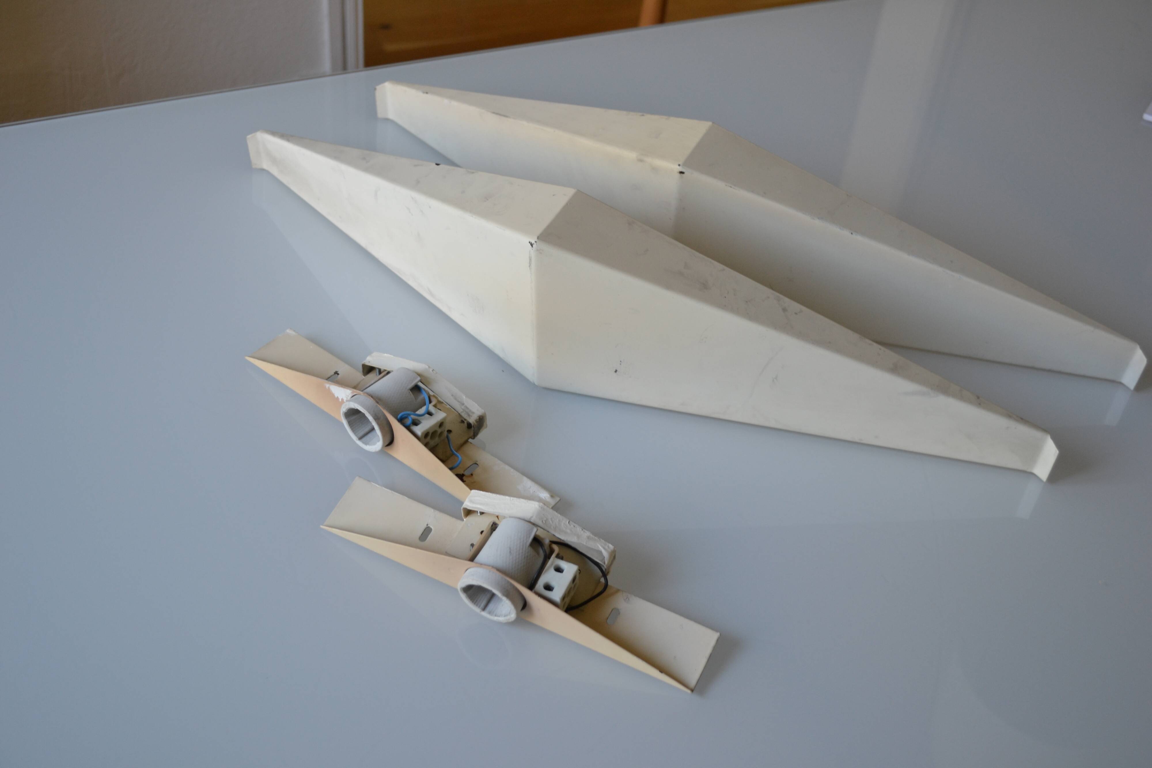 Pair of modernist reconstruction wall lamps