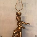 Deux enfants en bois sculpté doré, lampes de table