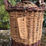 Glass and wicker cylinder