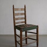 Rustic ladder-back oak chairs with embroidered seats | Netherlands | 1950s
