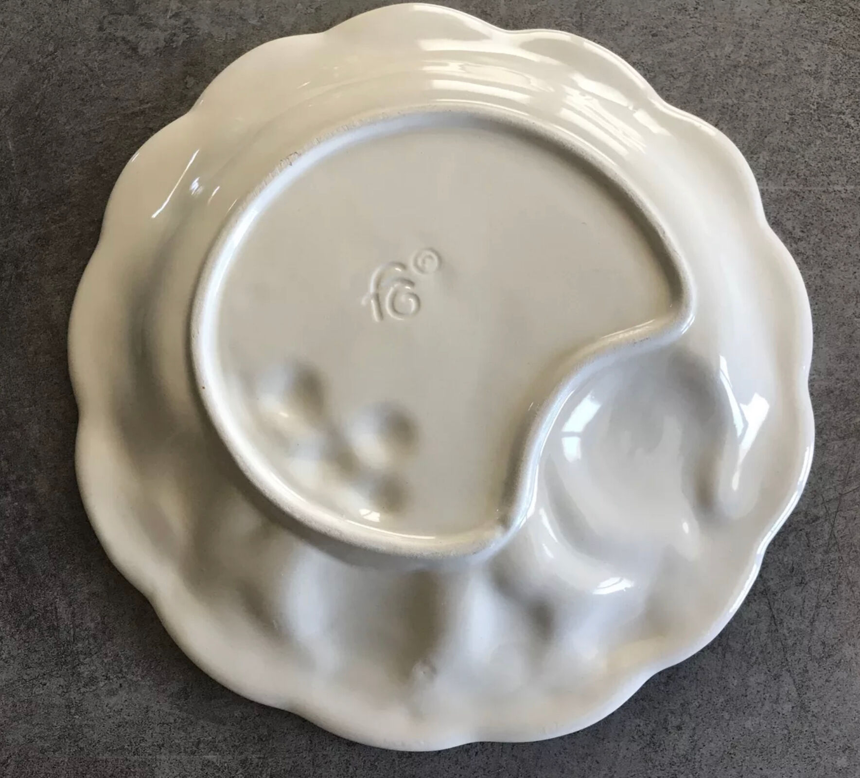 Vintage plate in ceramic enamelled decoration of fruits in relief