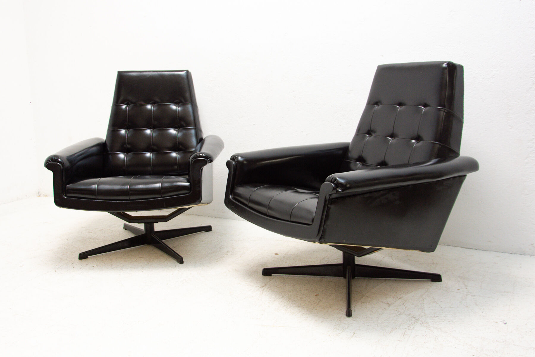 Pair of leather swivel armchairs from UP Zavody, 1970´s