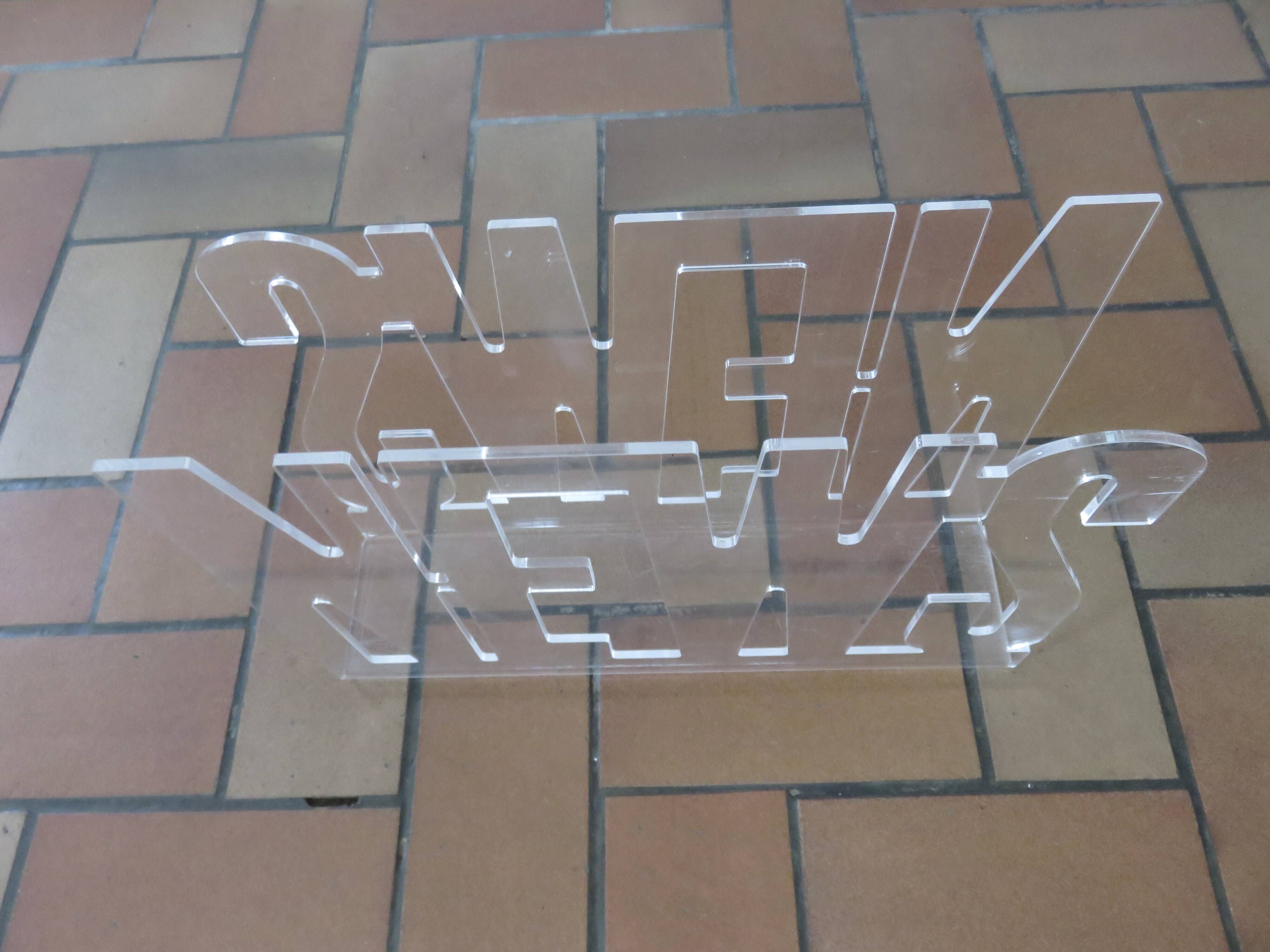 "News" magazine rack in transparent plexiglass, 1980s, vintage.