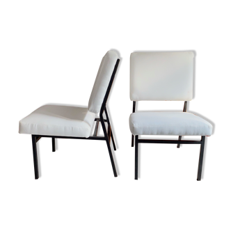 Pair of Paul Geoffroy designer armchairs produced by Airborne