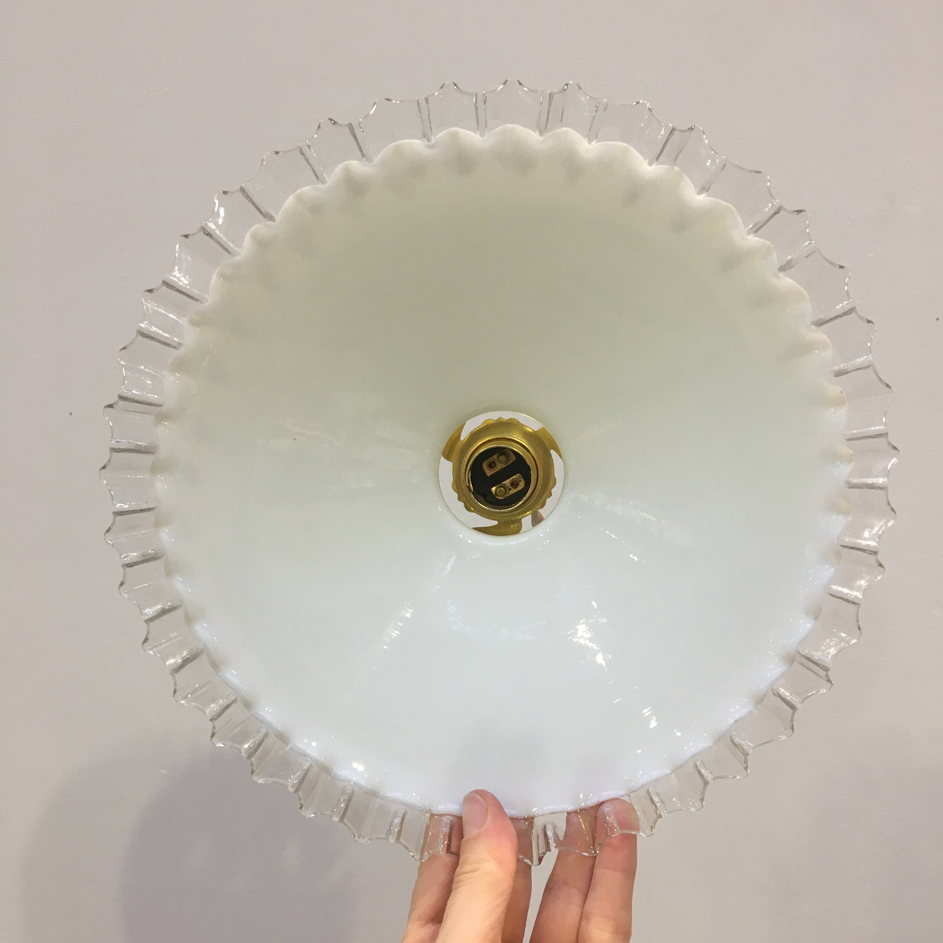 Pair of vintage pendant lights in white opaline and transparent serrated edges