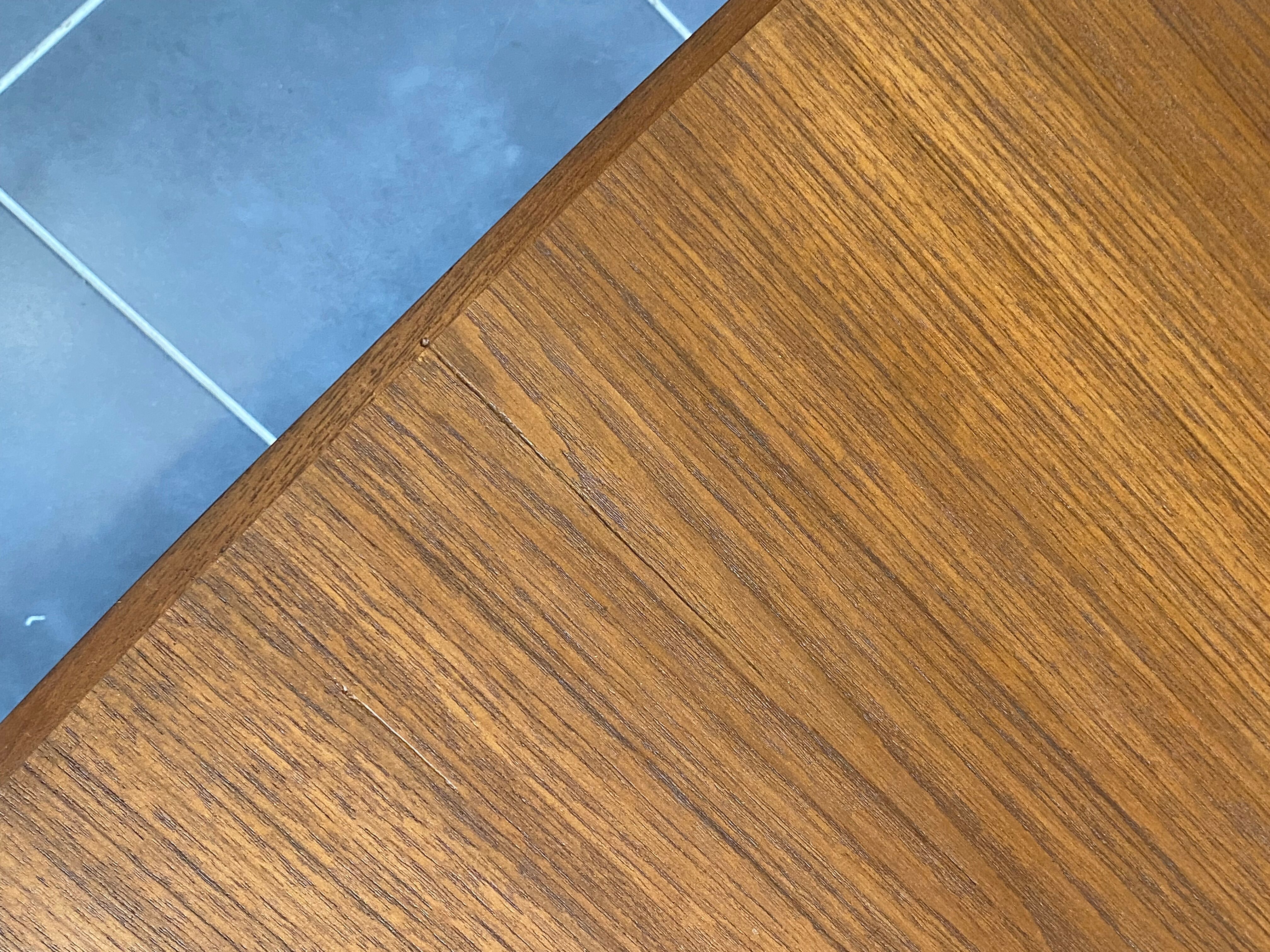 Extendable Scandinavian teak table by Johannes Andersen for Samcom Denmark.