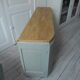 Art Deco furniture revisited in gray green and placed on wheels.