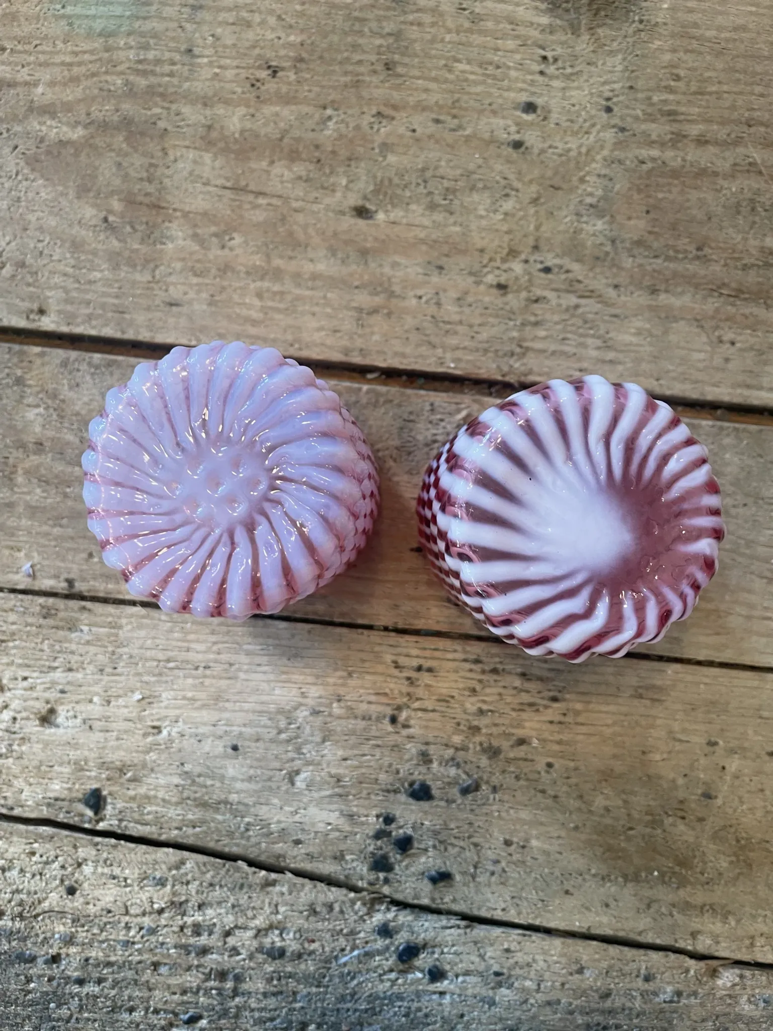 Two Northwood glasses from the 1930s in opalescent pink glass.