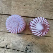 Two Northwood glasses from the 1930s in opalescent pink glass.